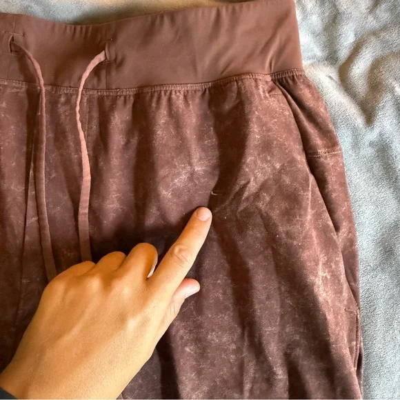 Lululemon Pace Breaker Shorts (7” inseam) in a Washed/Distressed Rust colorway. - Picture 2 of 4